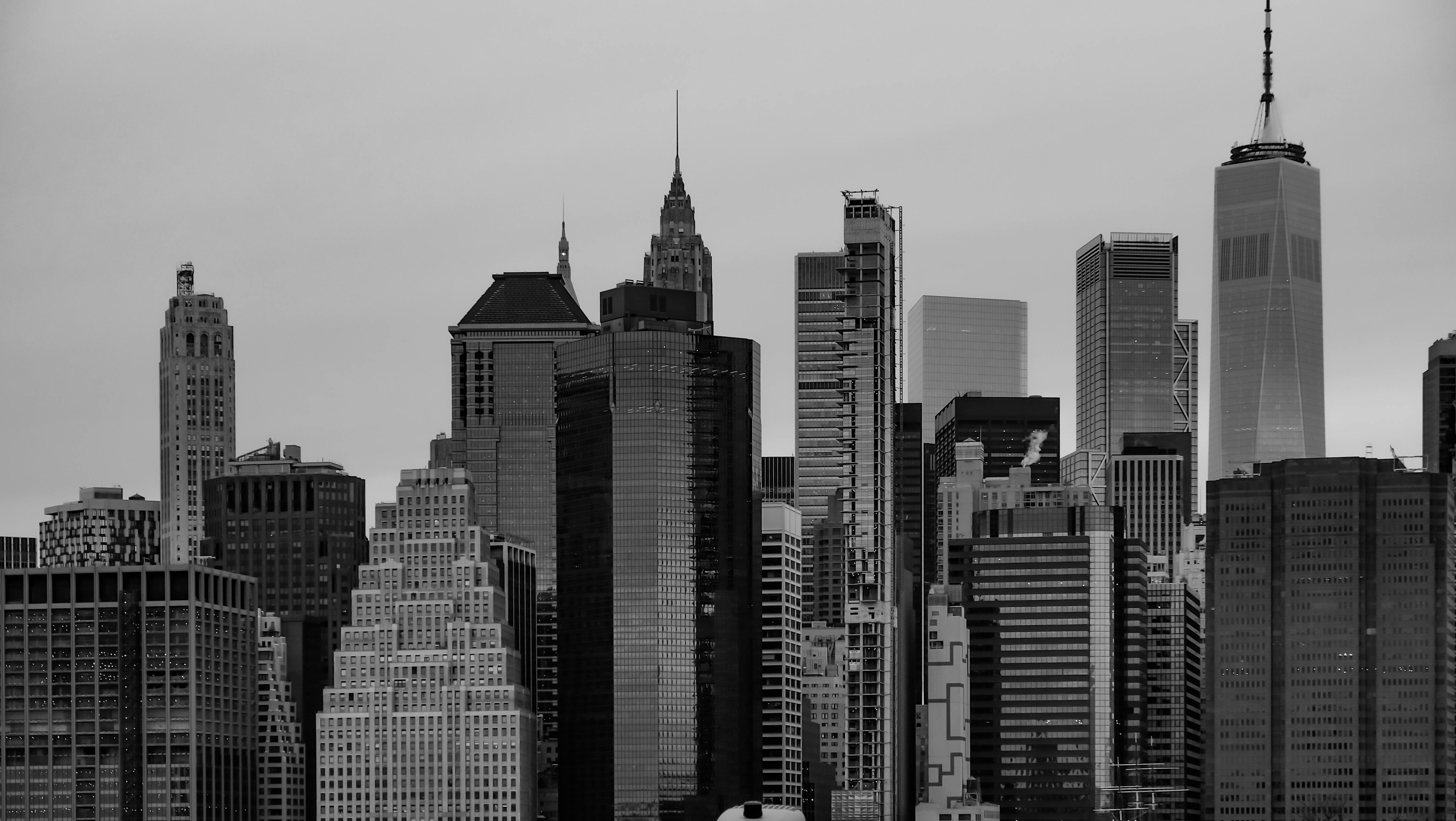 NYC Manhattan skyline showing high-rise buildings requiring parapet inspections under Local Law 126